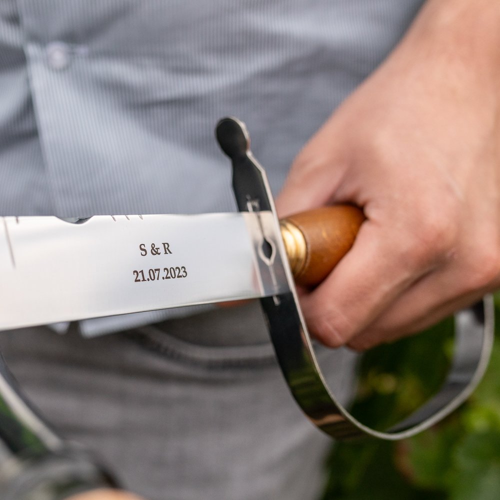Sabre à champagne en olivier, fabriqué à Thiers – Maison Mouche